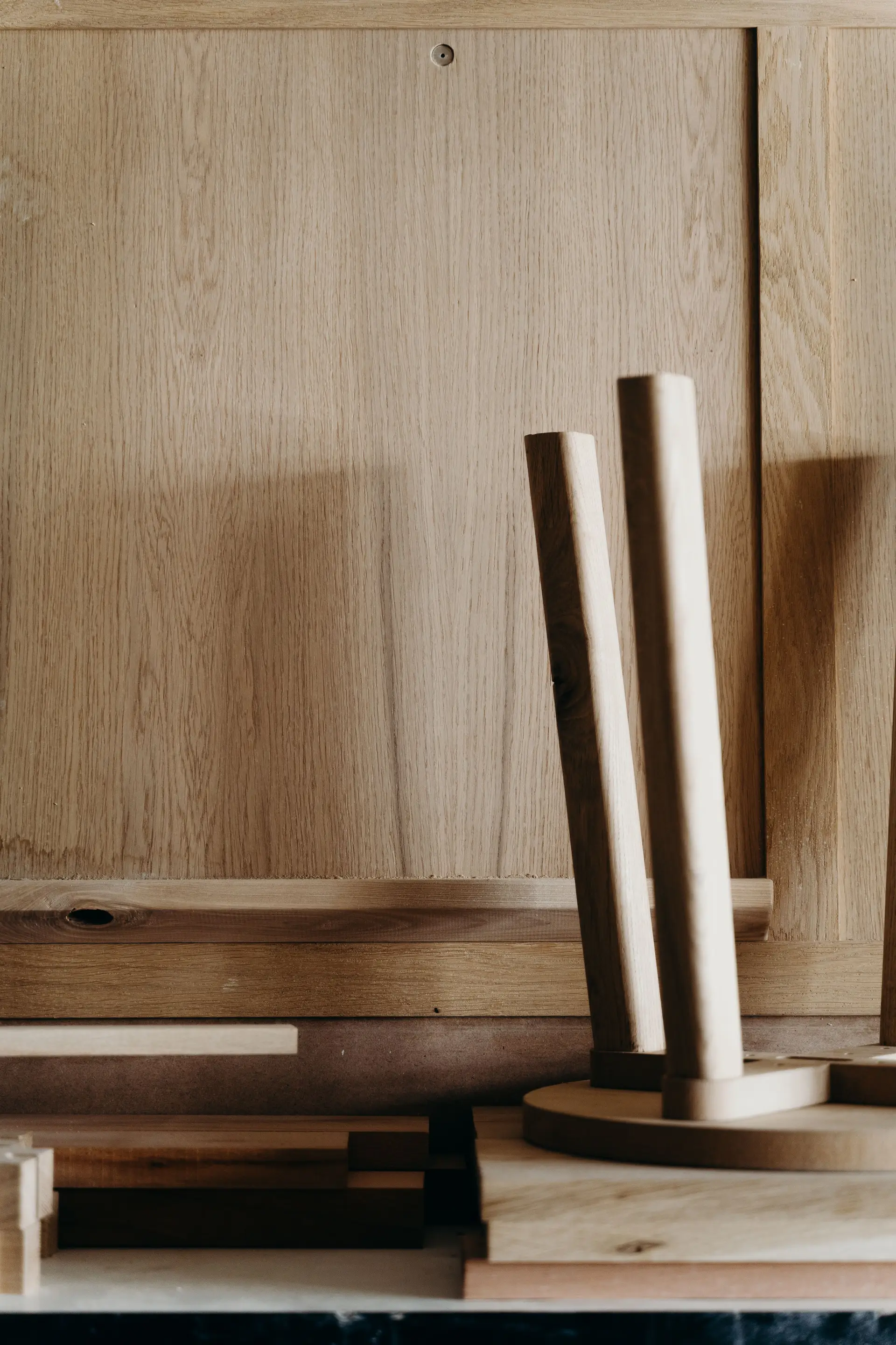 Master carpentry workbench with hand-turned timber components illustrating bespoke British furniture craftsmanship